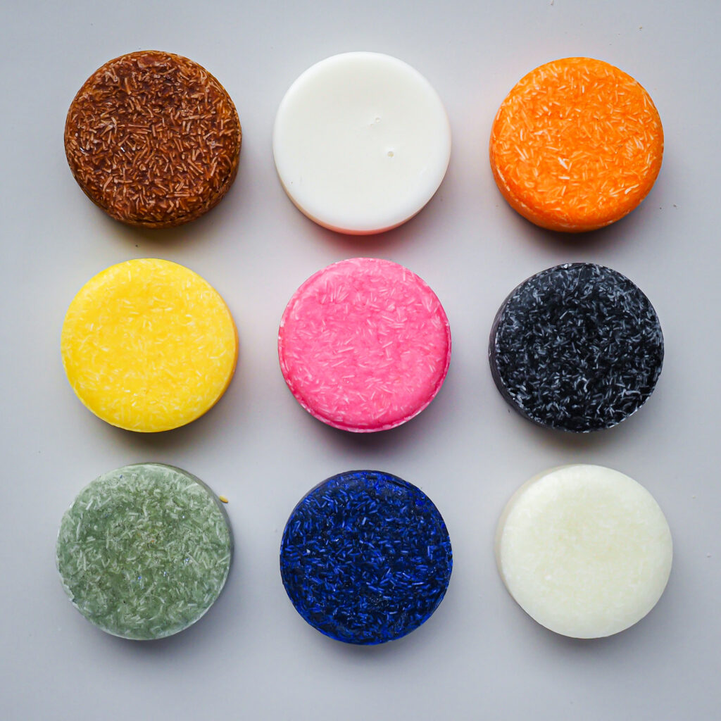 Colorful solid shampoo bars made with natural ingredients – eco-friendly and waterless haircare