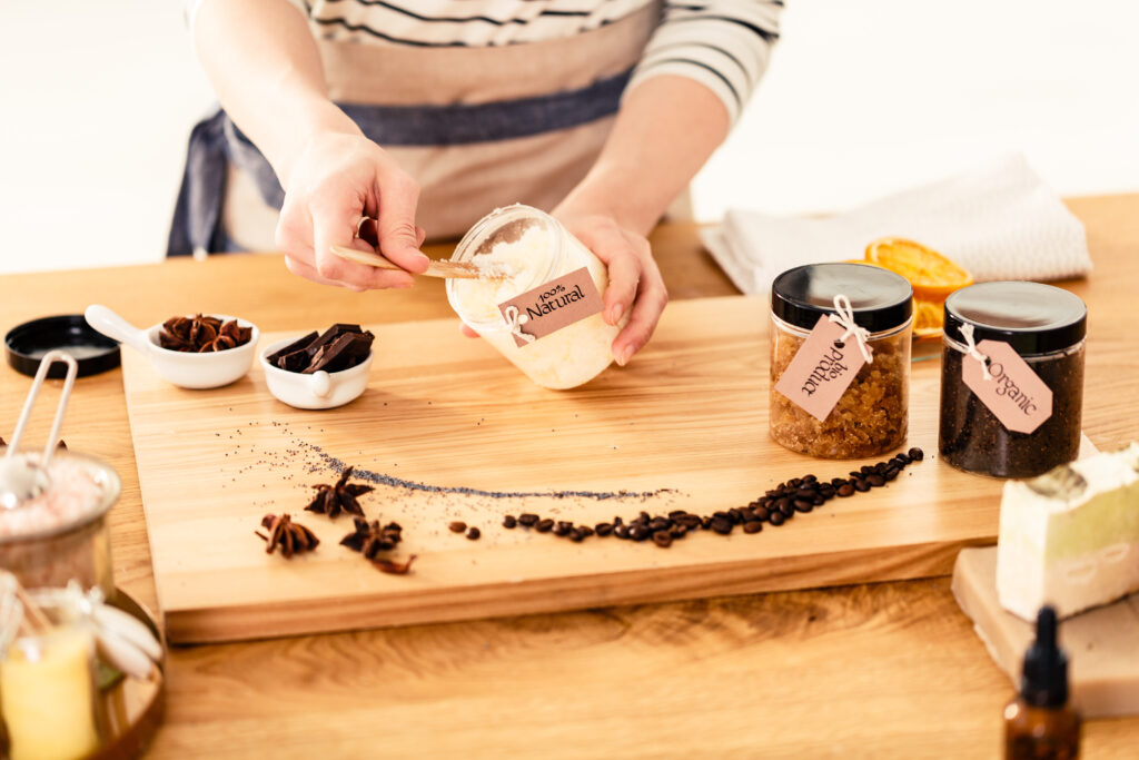 Woman making natural diy shampoo with coconut milk and essential oils